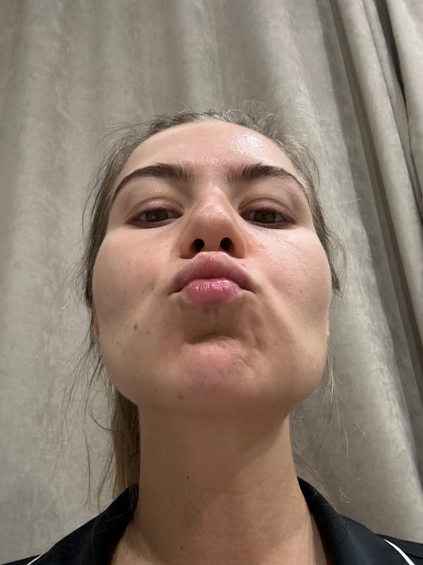 Laid-back indoor afternoon with selfies, flowers, and skincare