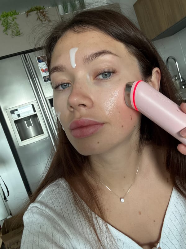 Woman performs morning skincare routine in Givatayim