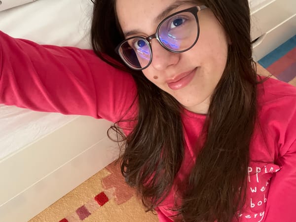 Person in pink shirt observed resting in Bulgaria