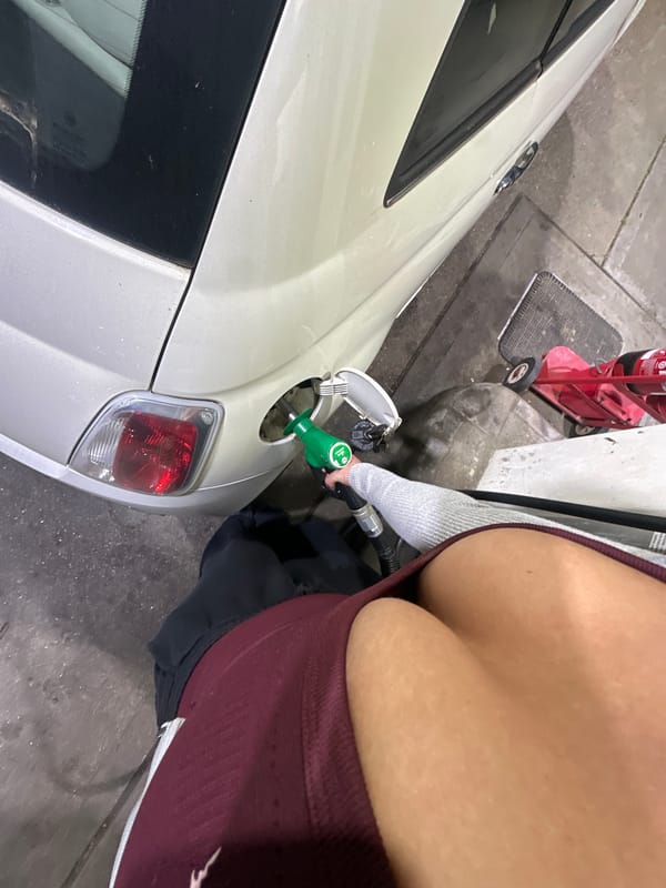 Person refuels car at Tunbridge Wells gas station