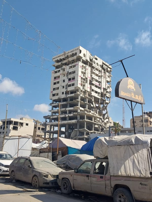 Daily commerce continues amid damaged buildings in Gaza City