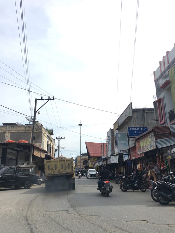 Early morning street scenes documented in Lhokseumawe residential area