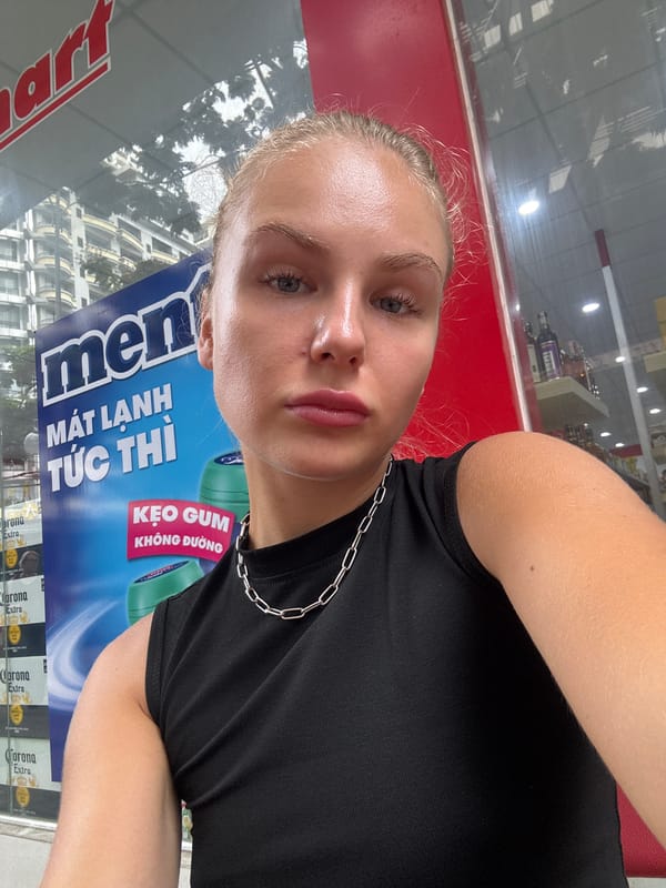 Storefront selfie on the streets of Nha Trang