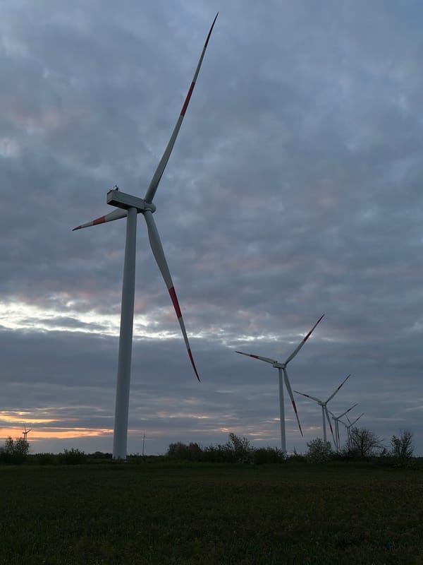 Wind turbines observed at dusk in Molchanovka, Russia