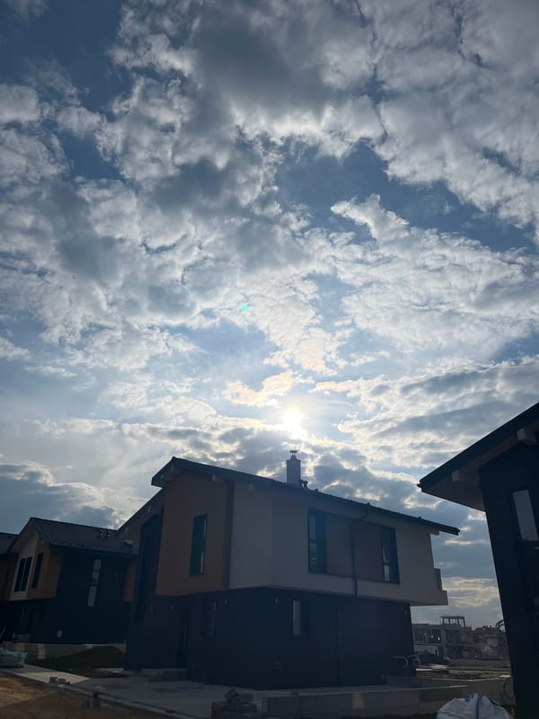 Residential development documented across Bulgarian towns under dramatic skies