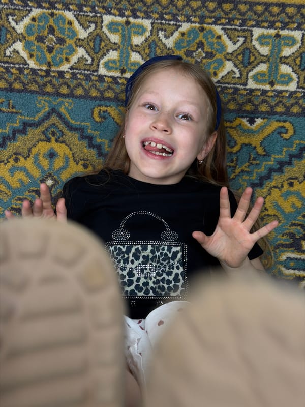 Girl bonds with pet rat in quiet moment