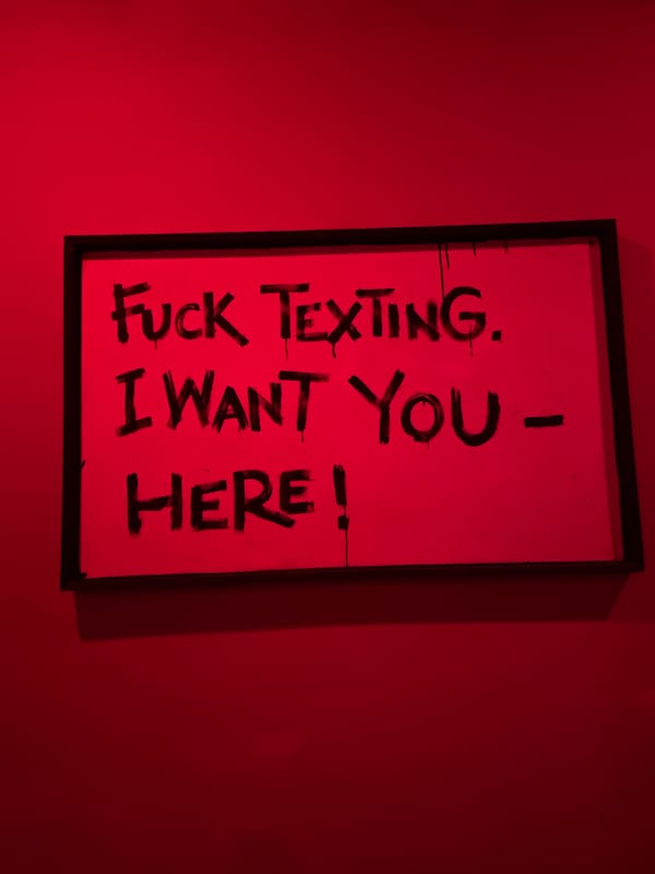 Anti-texting sign spotted on wall in North Kuta, Indonesia