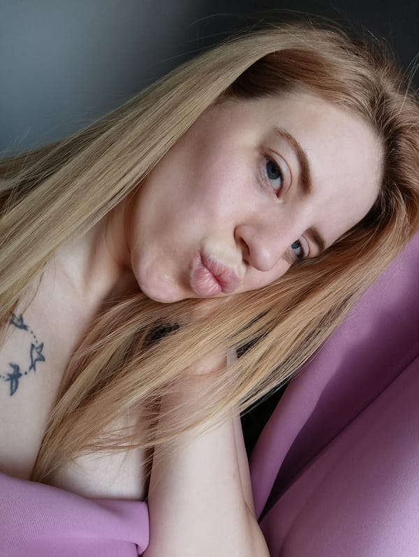 Portrait of blonde woman photographed indoors in Sofia
