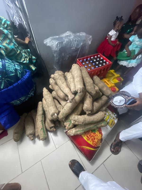 Community gathering with food distribution held in Lokoja hall