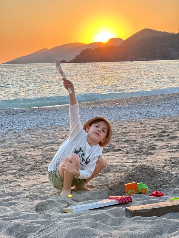 Family enjoys sunset beach time at Fethiye Turkey club
