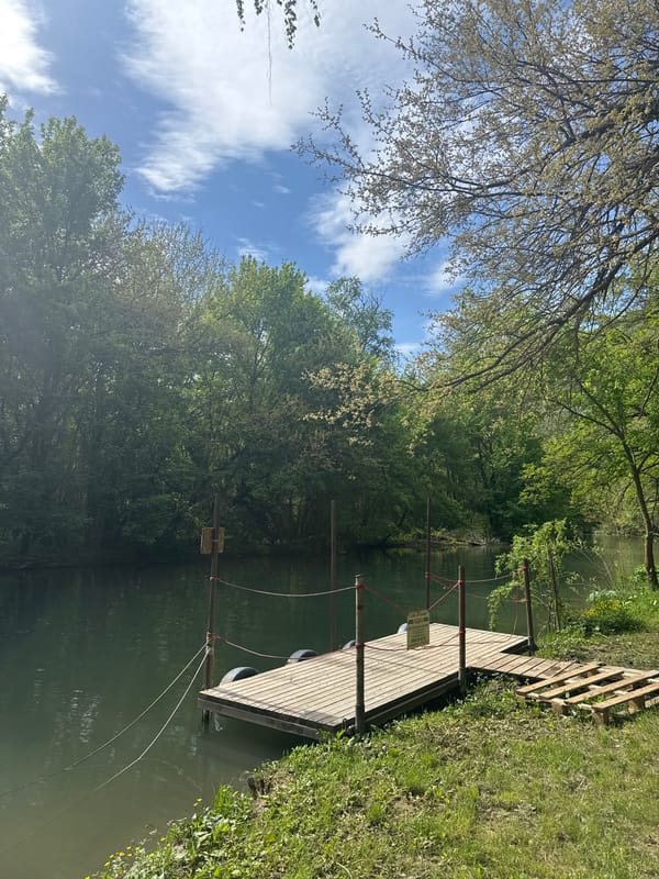 Wooden dock with metal poles observed over water in Lukovit