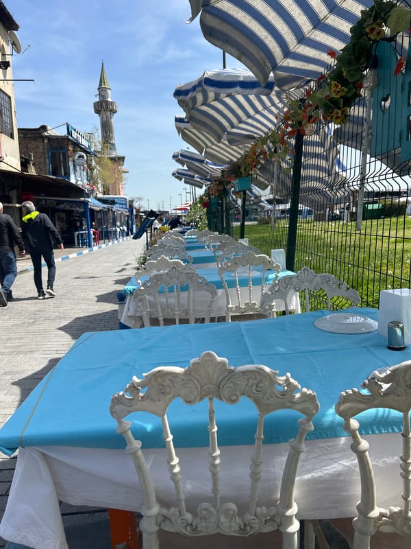 Outdoor dining tables arranged on Beyoğlu street