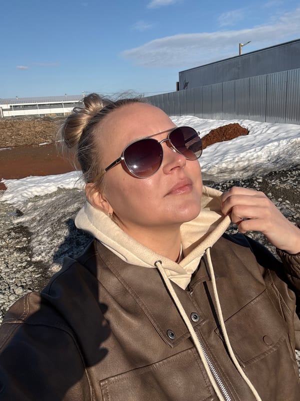 Woman lies on snowy ground in Izhevsk
