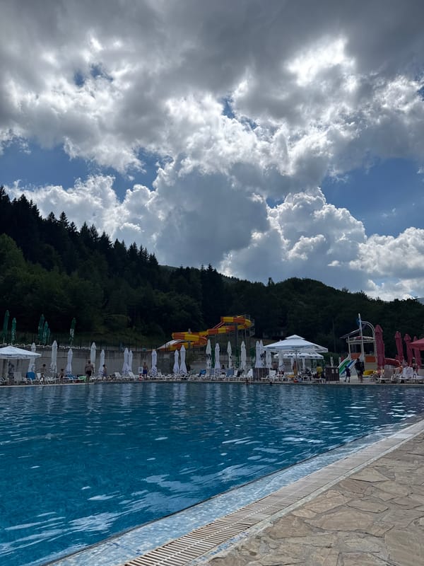 Busy summer afternoon at a Bulgarian resort pool