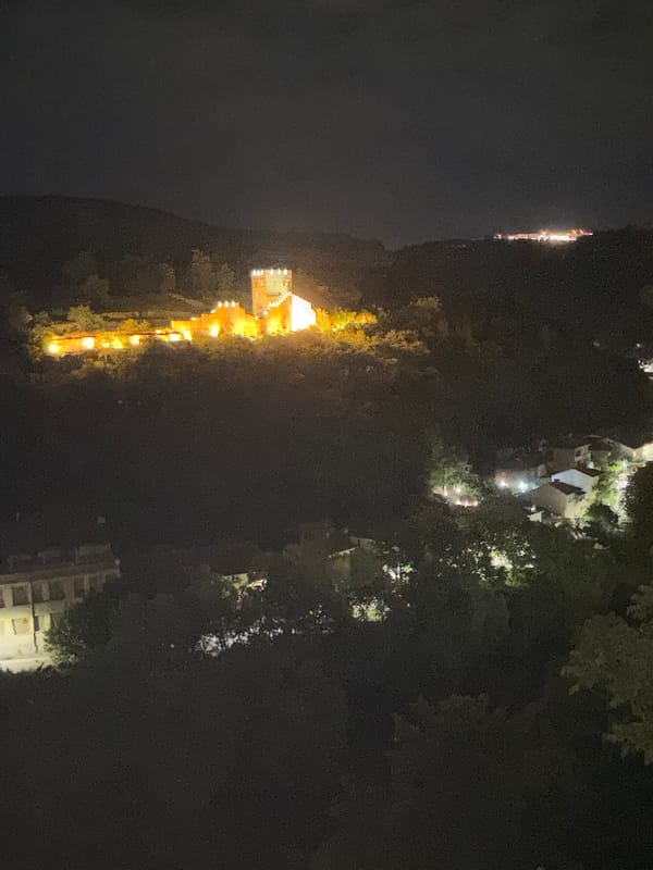 Evening stroll captures illuminated Veliko Tarnovo fortress and local scenes