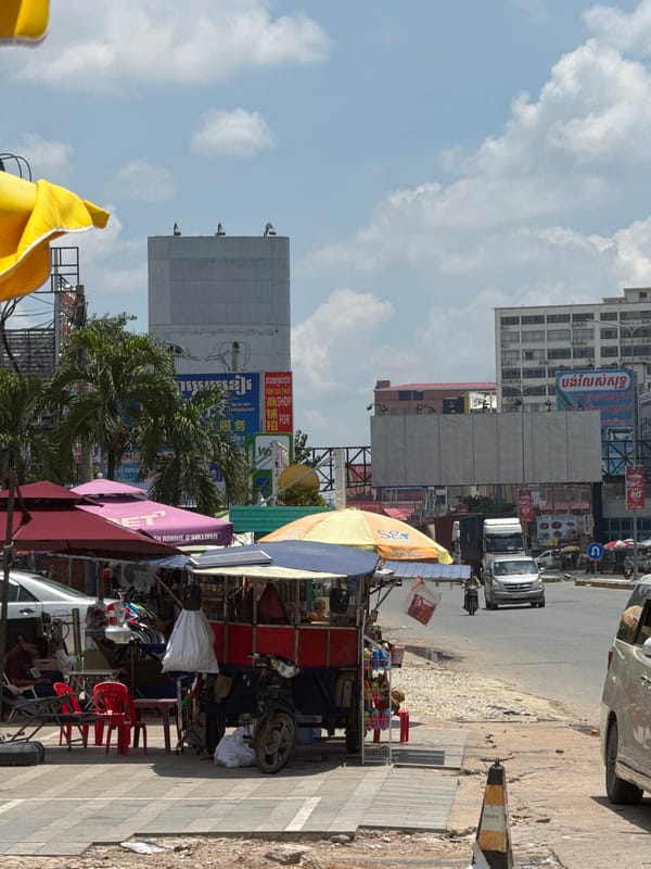Street life and traffic along Bavet Quarter's border town roads