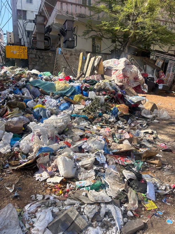 Late-night street documentation captures everyday Puttaparthi urban scenes