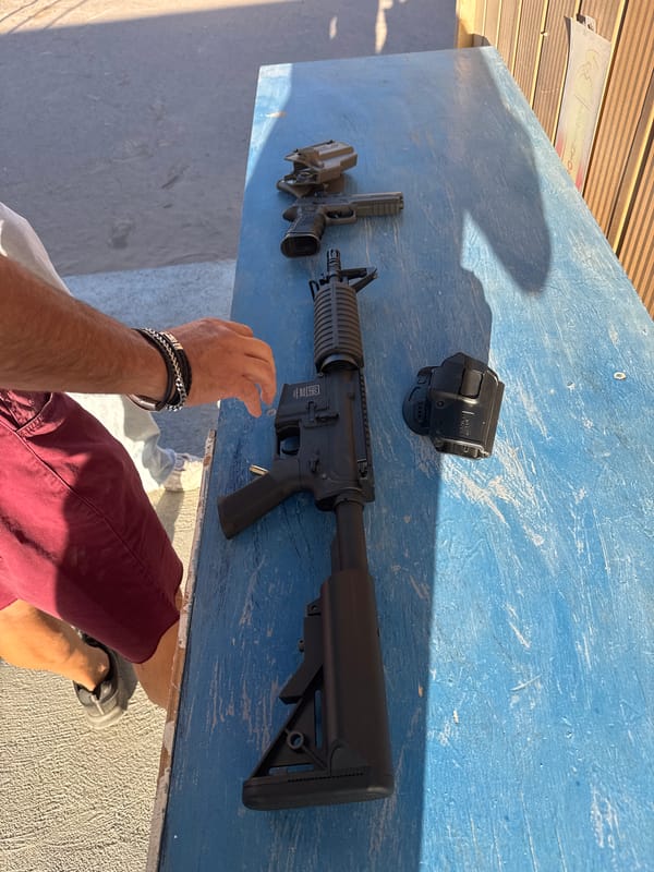 Firearms and ammunition documented on table in Arica, Chile