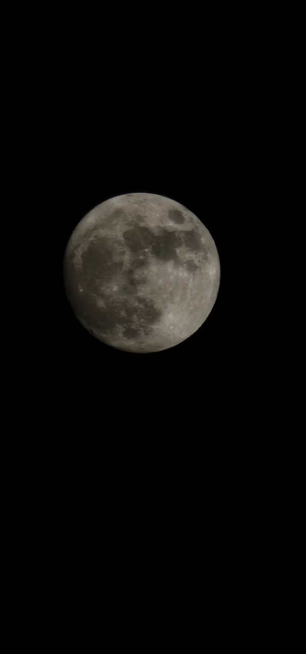 Full moon rises clear over Doha night sky