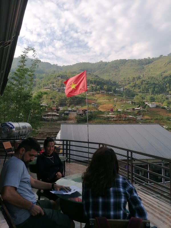 Daily life documented in Tả Van's rice terraces and restaurants