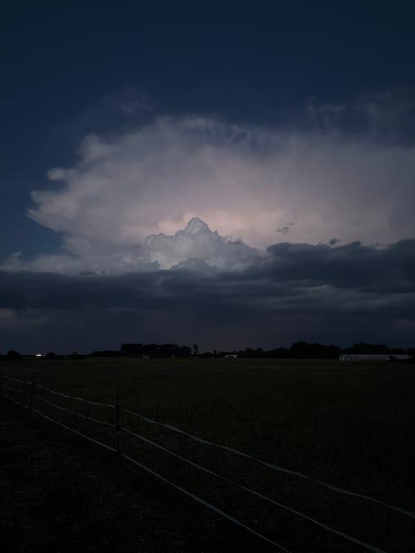 Storm clouds gather over Pishtigovo, Bulgaria at dusk