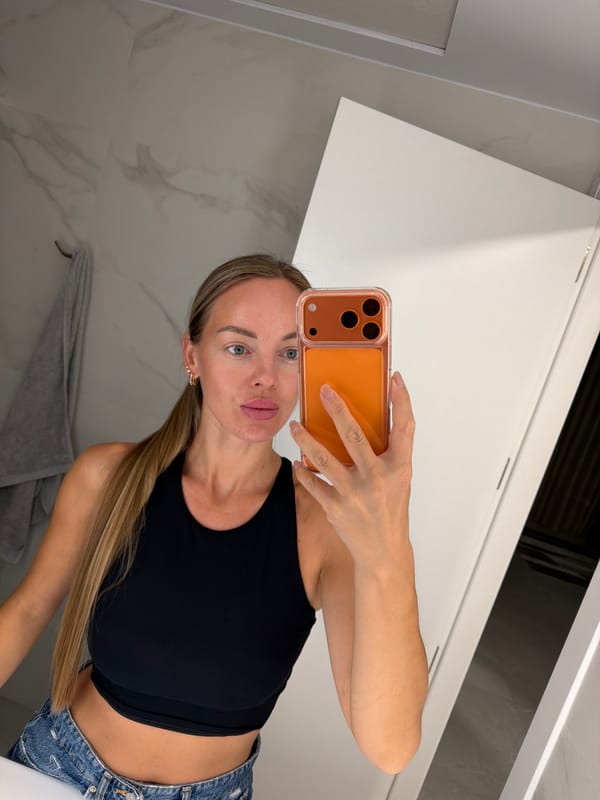 Mirror selfie in a marble bathroom, Finestrat, Spain