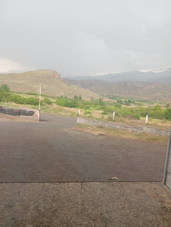 Mercedes on a lift, mountain roads, overcast Yeghegnadzor