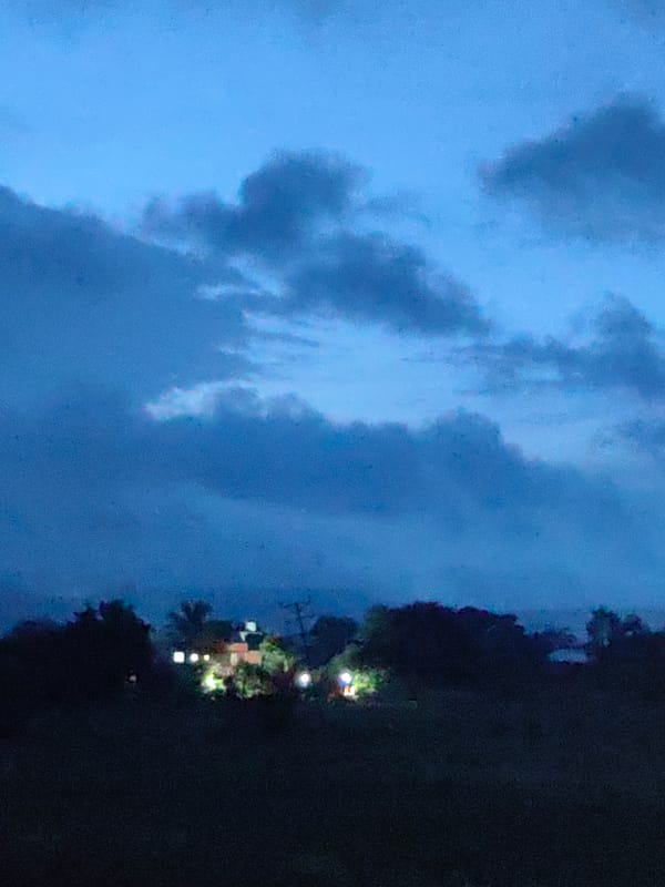 Khuldabad at dusk: misty hills, fields, and local landmarks