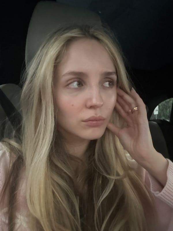 Woman takes car selfies during Mexico City rainstorm