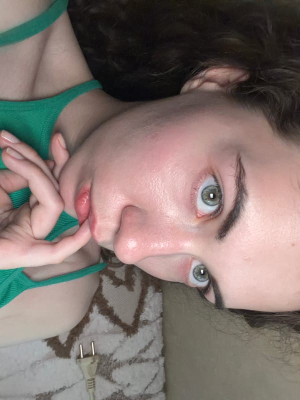 Casual indoor selfie session on a couch in Tyumen