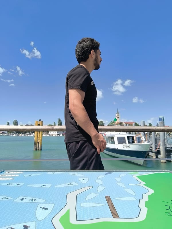 Young men document casual morning at Romanshorn waterfront event