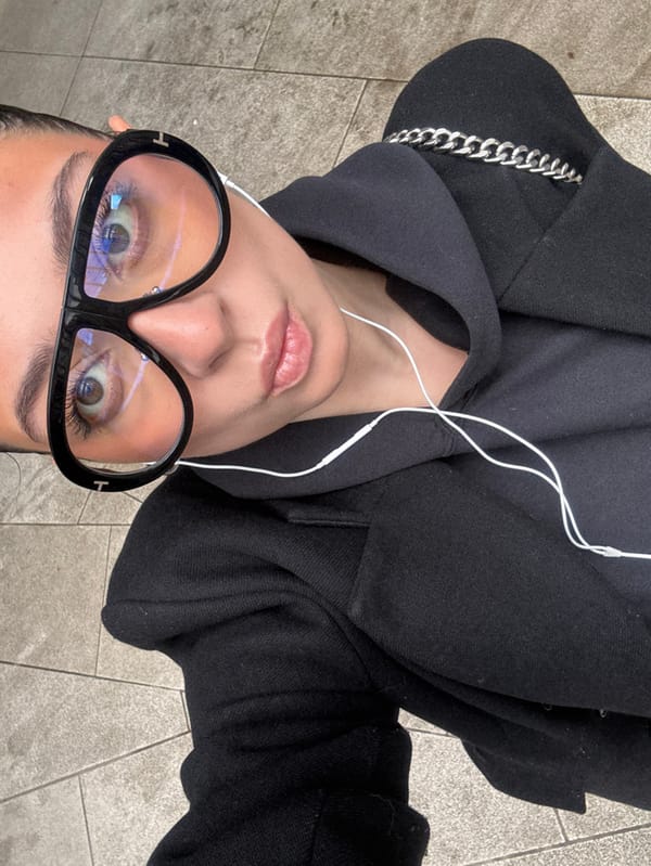 Woman photographed near public art installation in Courbevoie