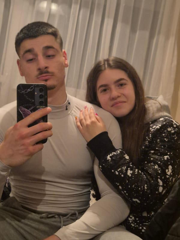 Young couple takes selfies together in Pavlikeni home