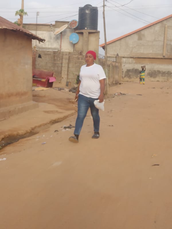 Morning street life documented in Yelwa, Nigeria residential area