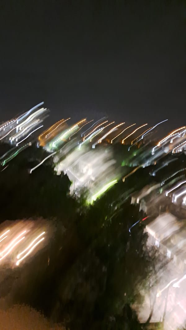 Nighttime residential area captured from elevated views