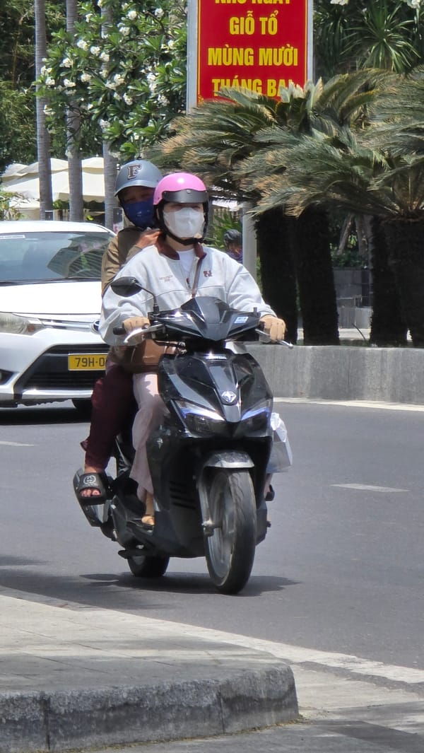 Early morning street activity captured in Nha Trang Ward