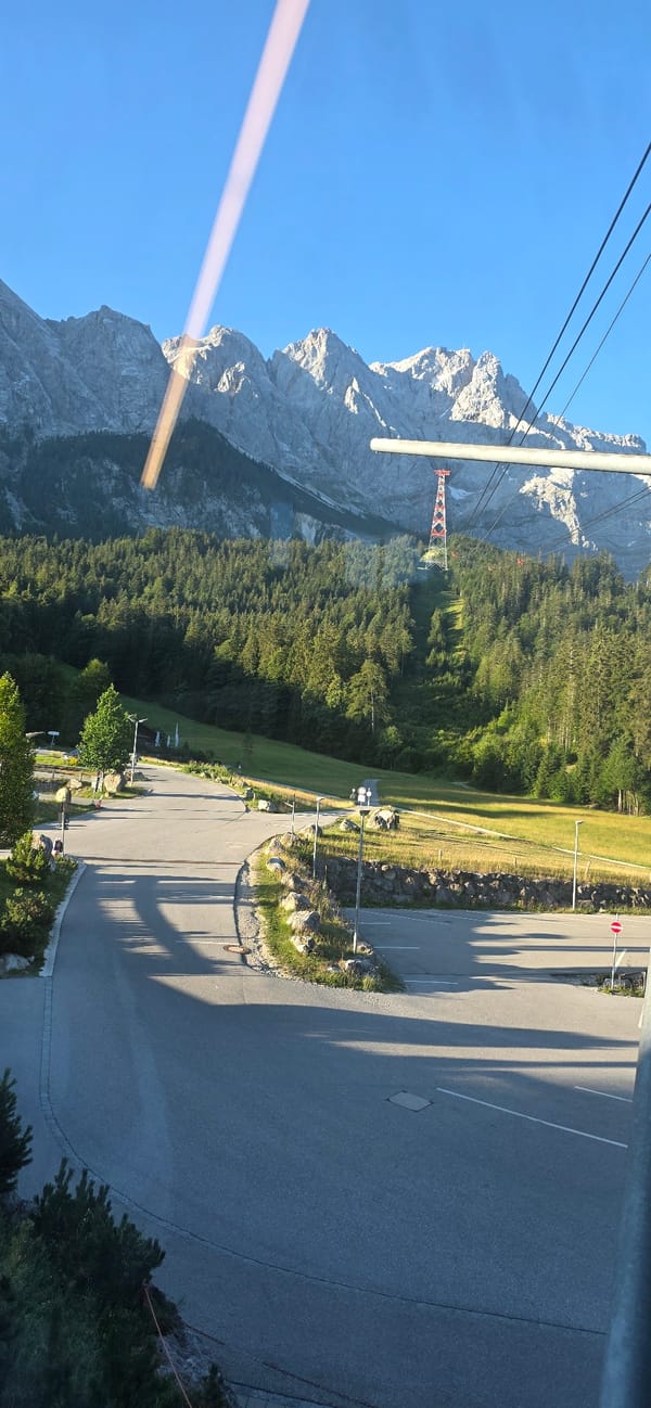 Riding the Zugspitze cable car on a clear summer morning