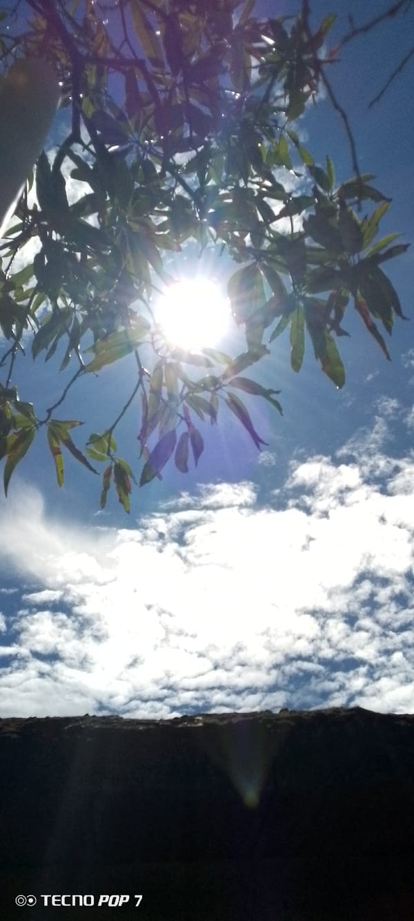 Midday sky-watching and street details in Altagracia, Venezuela