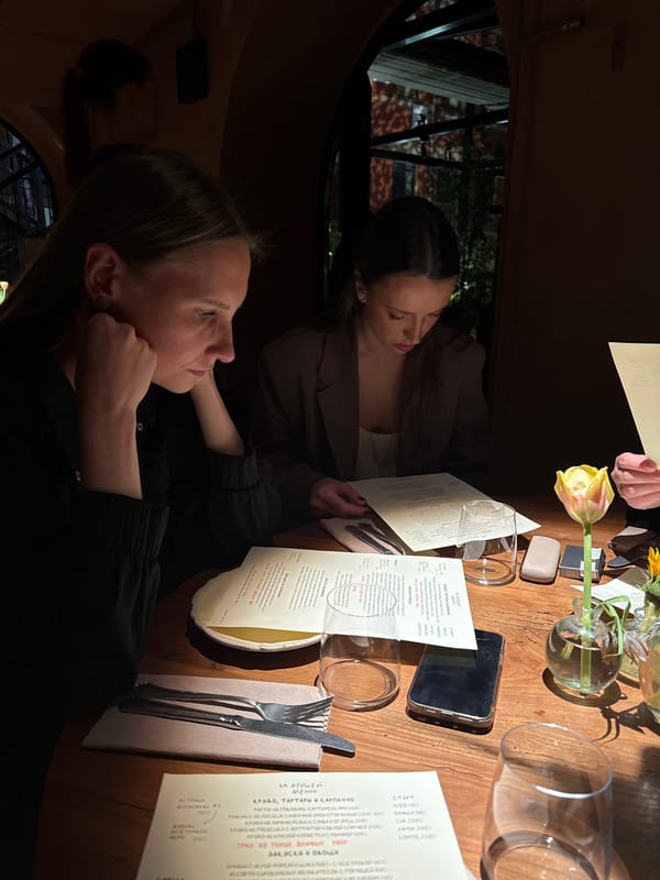 Two women dine at flower-decorated Moscow restaurant