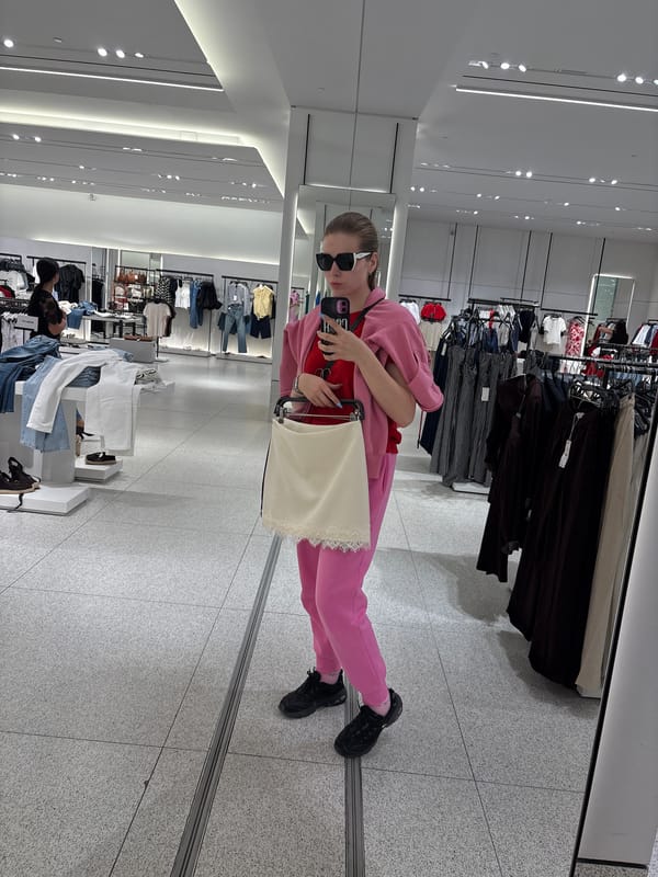 Shopper Takes Mirror Selfie in Plovdiv Clothing Store
