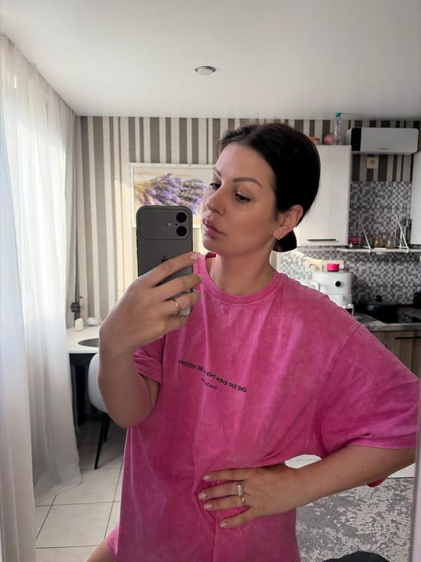 Morning at home in Sochi, pink t-shirt and coffee in hand