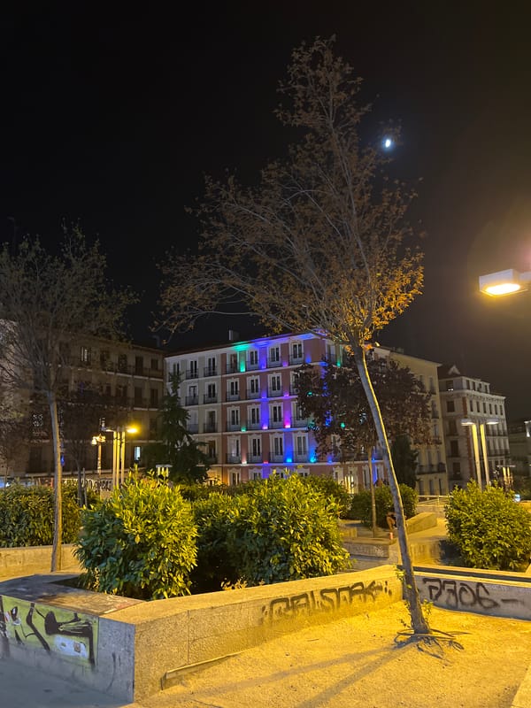 Callao square buzzes with street life on a Madrid summer evening