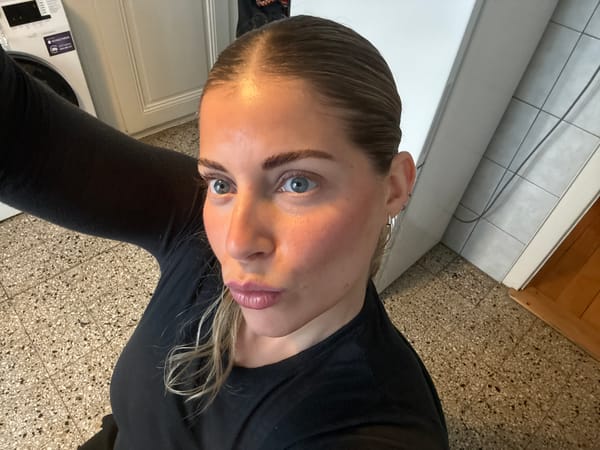 Woman Takes Selfies in Geneva Residence