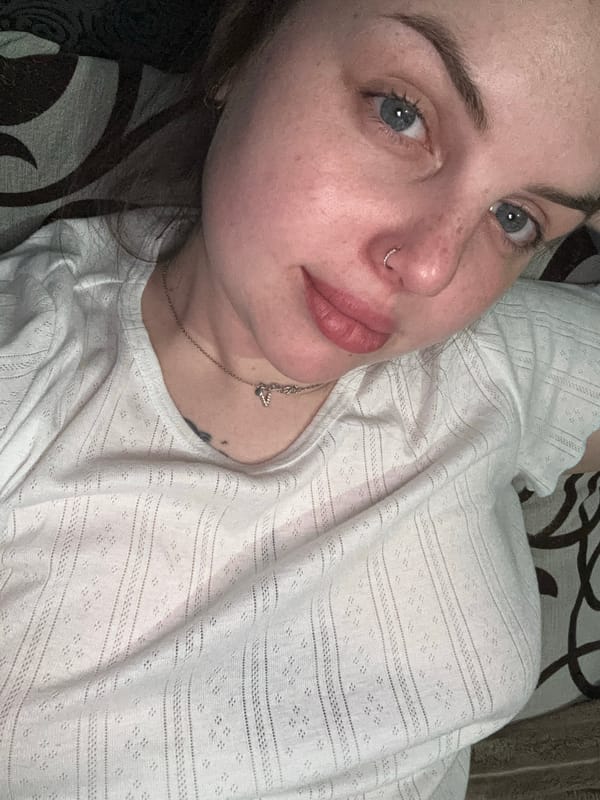 Woman photographed resting with meal in Chornomorskoe, Ukraine