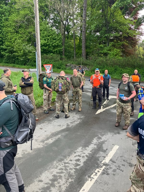 Group gathers on road in Newbiggin on Lune