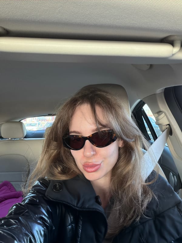 Woman Takes Selfie in Car in Kommunarka, Russia