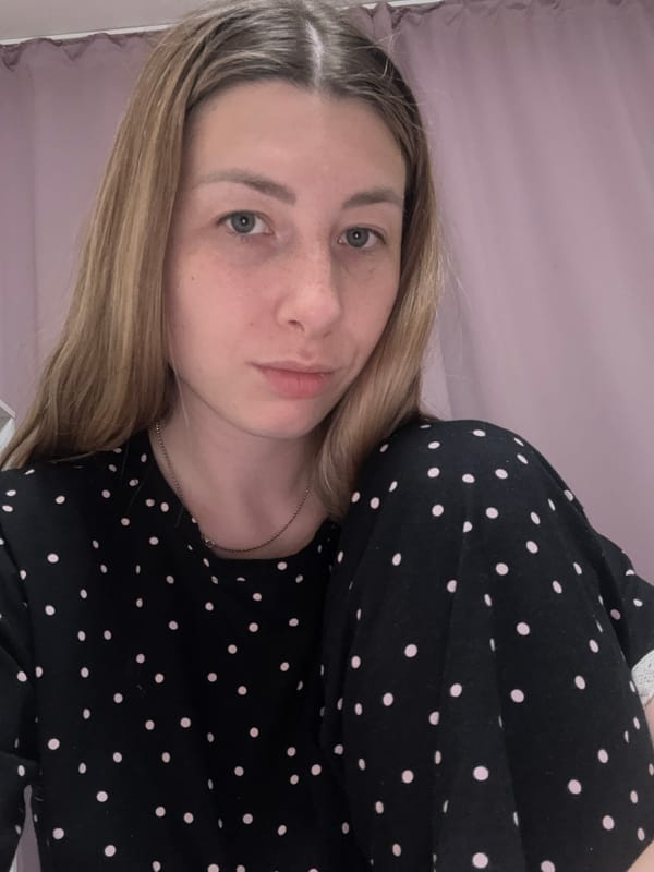 Woman takes selfies in polka-dot outfit in Moscow