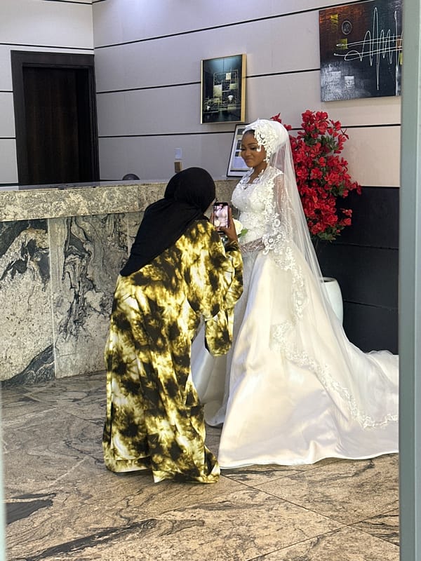 Wedding celebrations at an Abuja hotel, bridal party in full swing