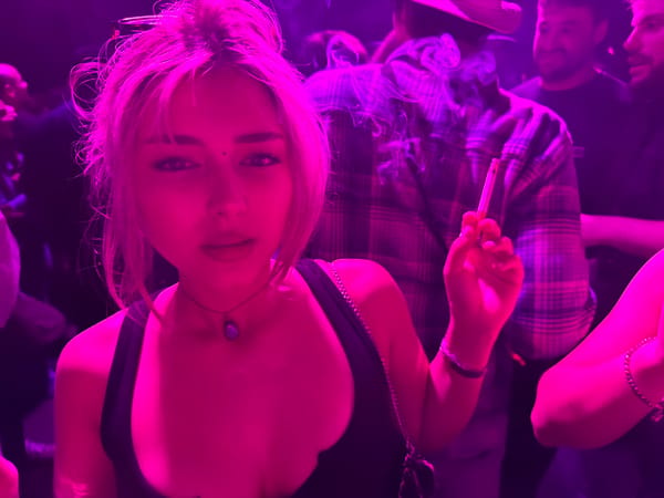 Young women spotted at purple-lit Barcelona nightclub early Sunday