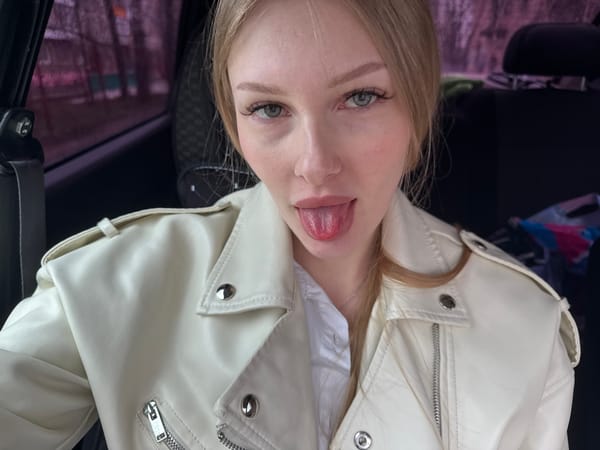 Woman takes playful car selfies in Perm, Russia